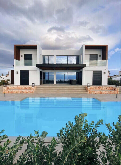 Modern white villa with a pool