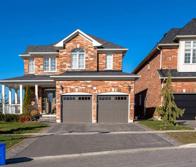 Brick family house with a double garage