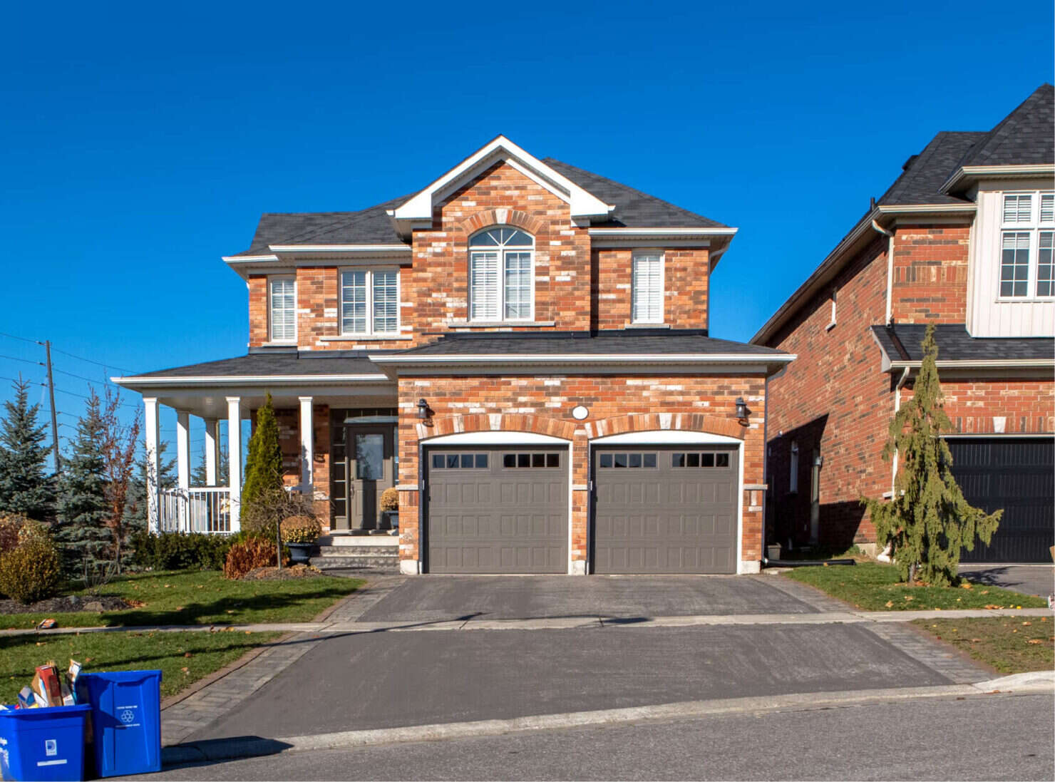 Brick family house with a double garage