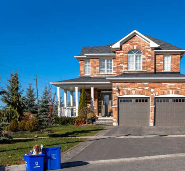 Brick house with a porch and garage